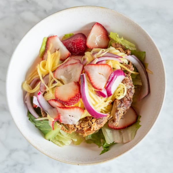 Phattra Thai Restaurant's soft shell crab salad with strawberries, red onion, and mango.